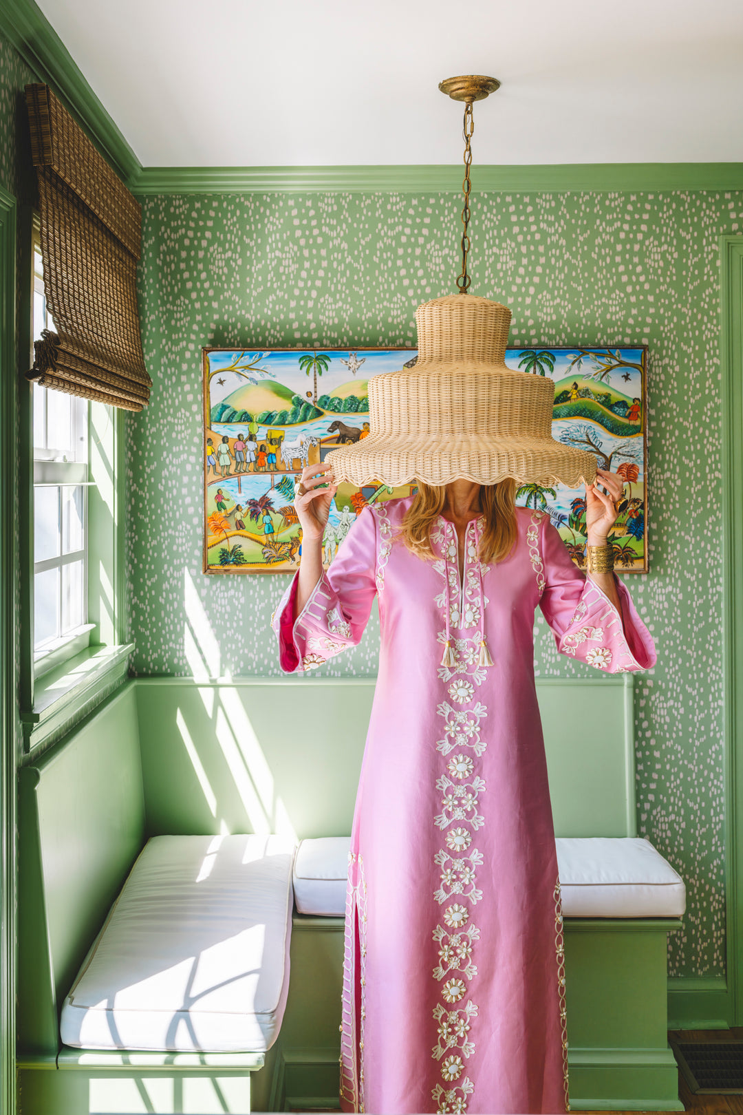 oink dress with woman under rattan lampshade