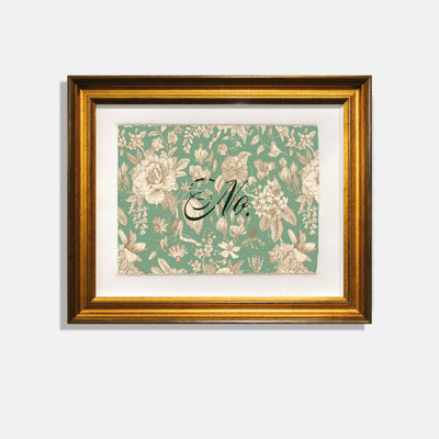 green wallpaper with floral print and text quote "no" in gold frame