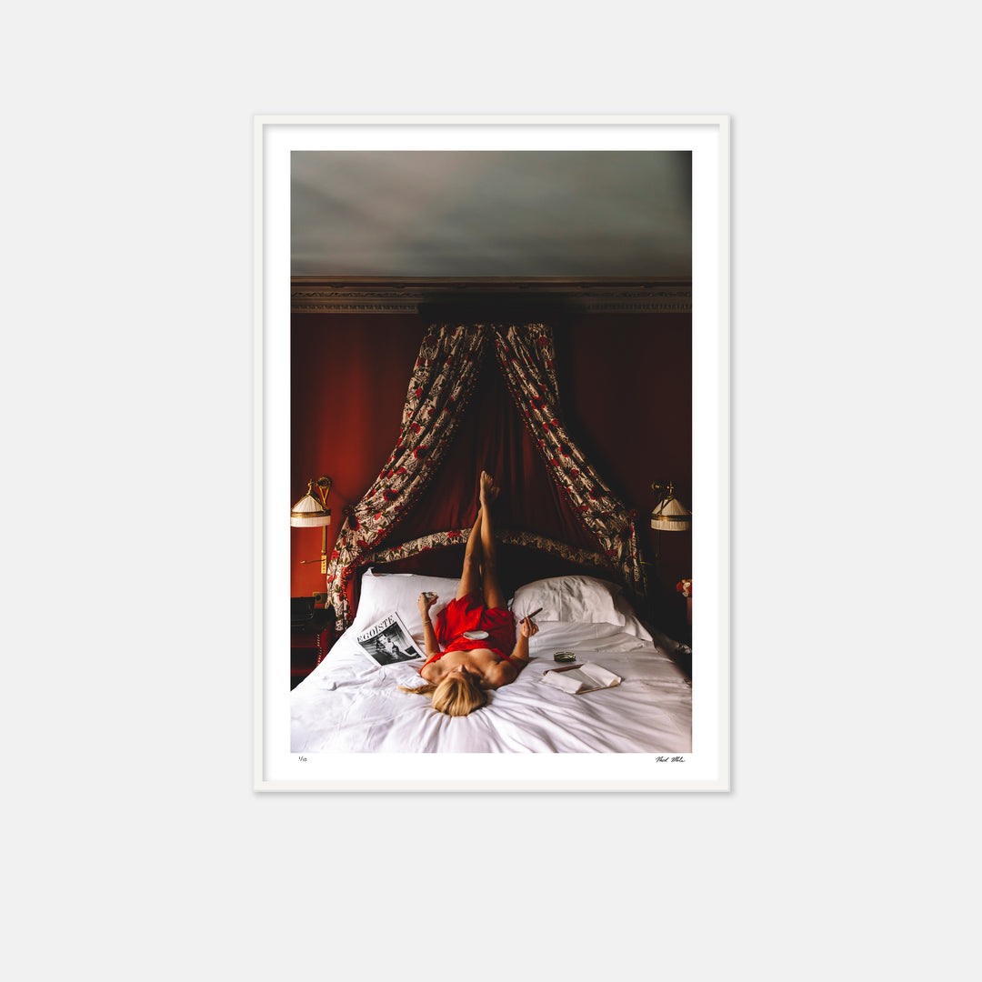 woman in red dress smoking a cigar with coffee 