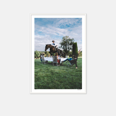 framed image of a horse jumping over a table