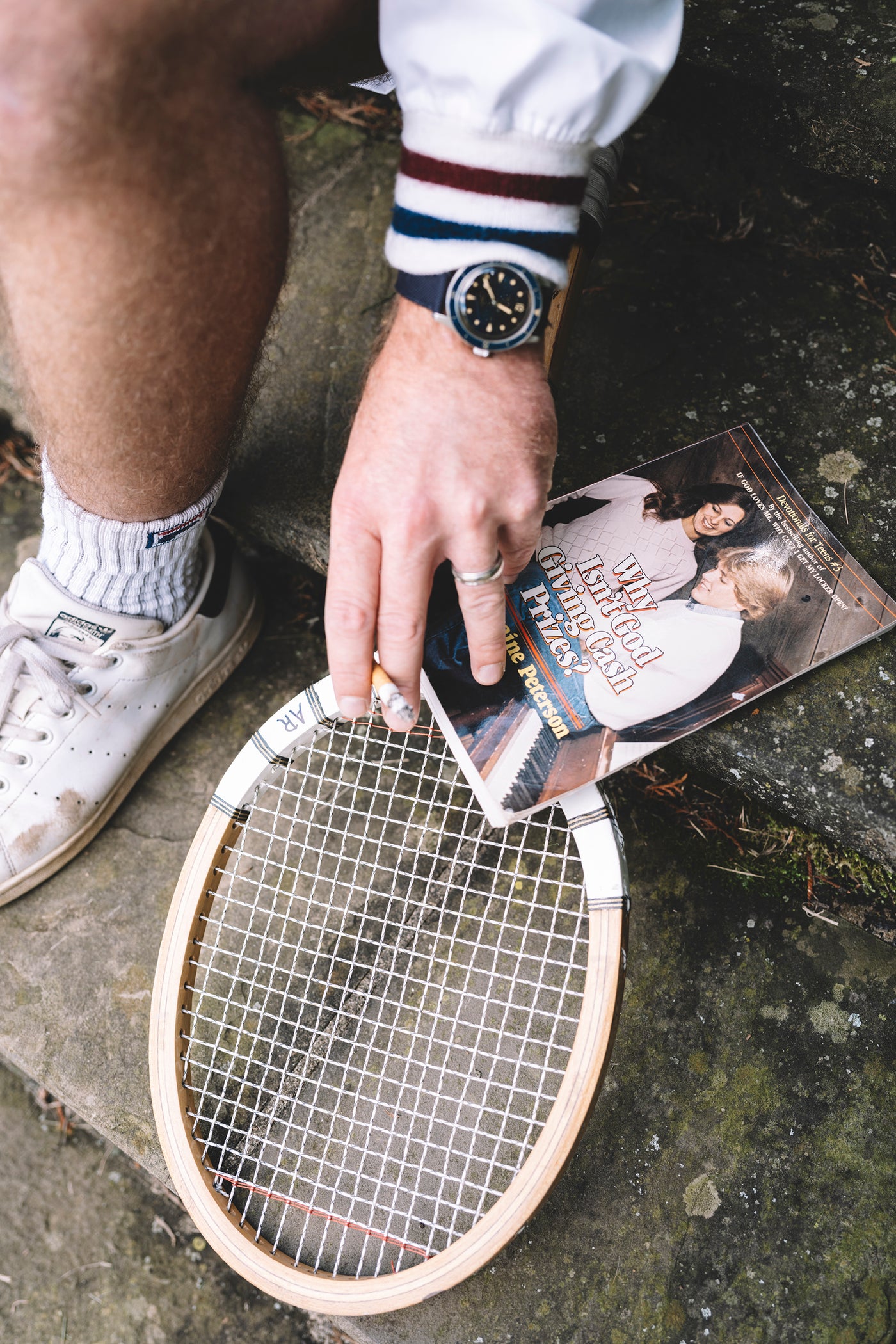 vinateg tennis racquet with book and cigarette 