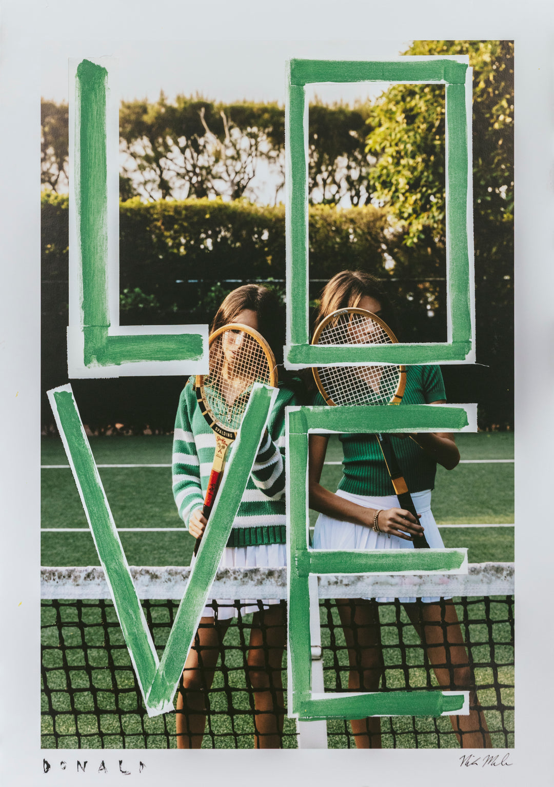 Two people holding tennis rackets with 'LOVE' spelled out in green letters on a tennis court.
