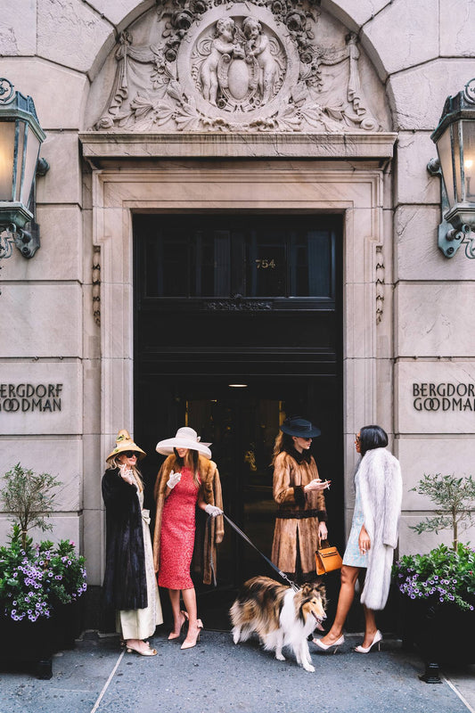 Four women in furs and hats with a collie at the Bergdorf Goodman entrance. Nick Mele x Bergdorf Goodman, A New York Affair