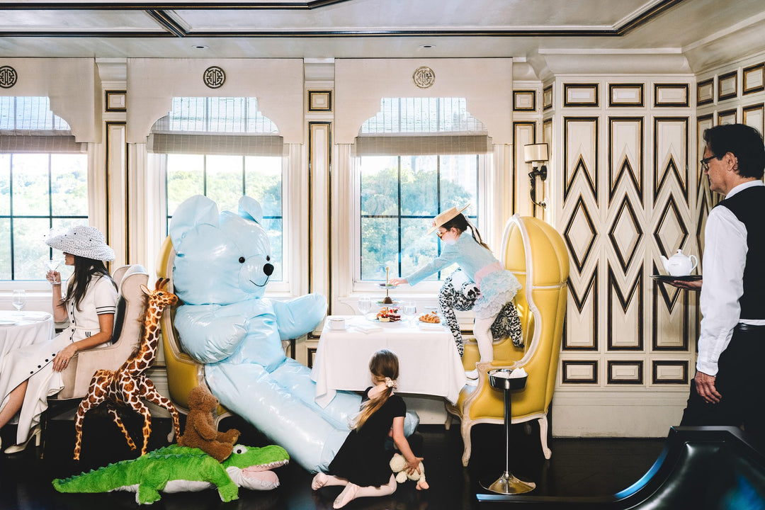 Giant inflatable teddy bear and stuffed animals at an elegant afternoon tea. Nick Mele x Bergdorf Goodman, A New York Affair