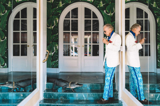 lilly pulitzer, vinatge lilly pulitzer, lilly pulitzer men, white dinner jacket, alligator, palm walllpaper, the colony hotel, vintage palm beach, palm beach fashion, alligator at hotel, green marble stairs, green marble, alligator gold chain